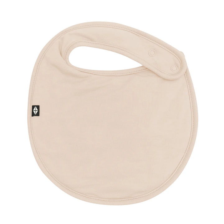 Kyte Baby Cushy Bib - Bisque