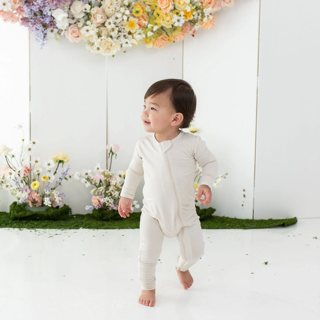 Kyte Baby Zippered Romper - Ecru Kyte Baby Zippered Romper - Ecru